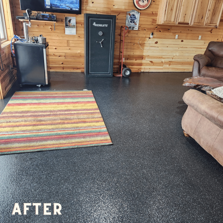 A photo of a garage floor with a decorative and seamless finish, created by the application of an epoxy flake coating. The coating enhances the durability, slip resistance, and overall appearance of the floor, making it suitable for use in a garage setting.