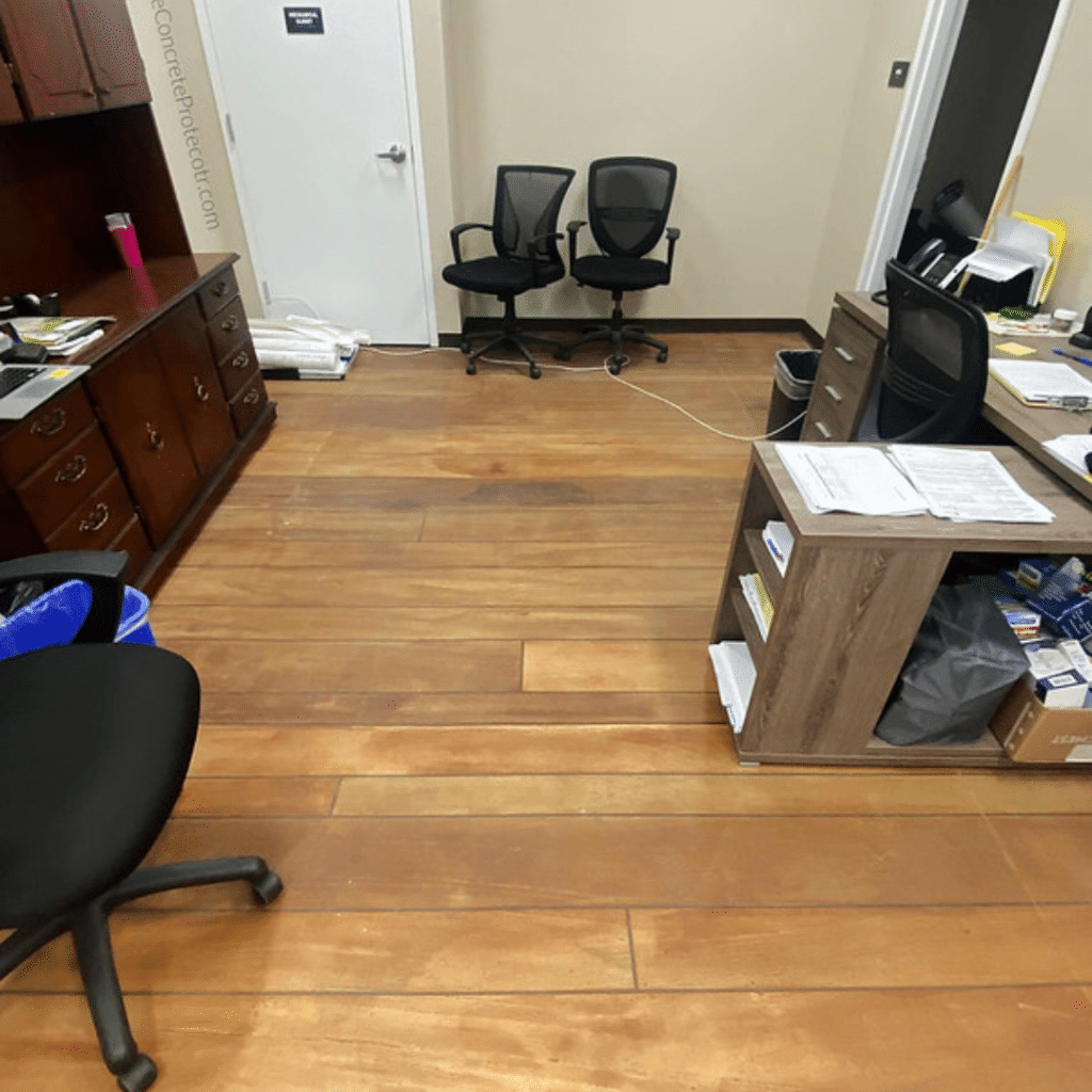 Rustic Concrete Wood Office with a concrete flooring surface that mimics the look of wood grain. The flooring has a matte finish with natural variations in color, creating a rustic and textured appearance.