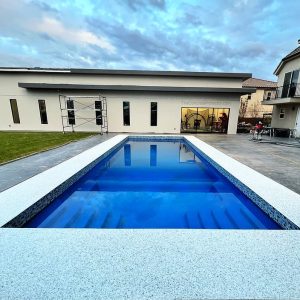 GRANIFLEX Epoxy Coating Pool Deck - A durable and stylish coating system for pool decks, with a slip-resistant finish and weather-resistant properties.